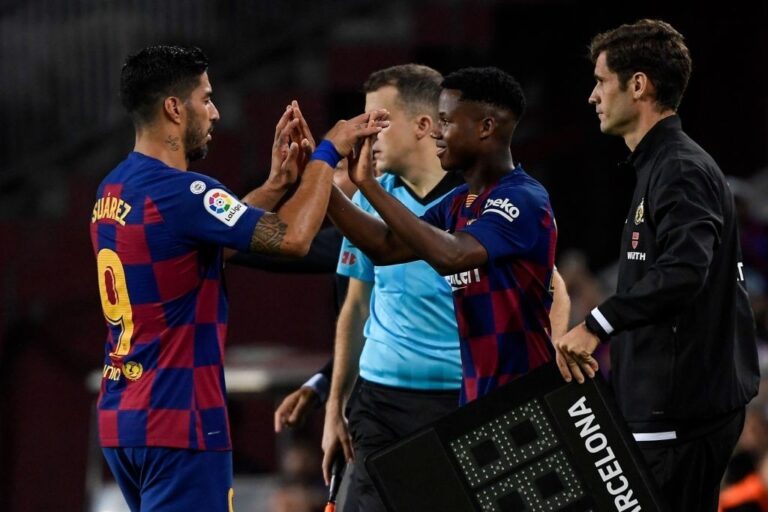 LLUIS GENE/AFP/Getty Images